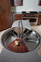 rotating sink with cutting board and colander