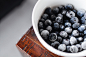 Close-up of frozen blueberries in a white bowl