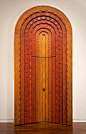 stunning. beautiful carved door.