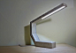 Concrete desk lamp by Mark Moskovitz. Fiftytwothousand. prototype.