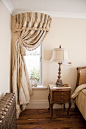 The curved rod really takes this treatment to the next level. #drapes #curtains