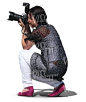 A woman with a camera taking a photo