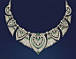 A DIAMOND AND EMERALD NECKLACE Composed of a series of graduated palmette panels with stylised bell flower panels between, set throughout with circular-cut diamonds with calibré emerald detail and diamond and emerald collet accents, to a trace link neckch