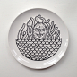 The Dirty Dozen : A dozen hand drawn ceramic plates using a posca pen.