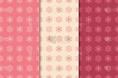 雪花模式。一套樱桃红无缝背景与圣诞元素