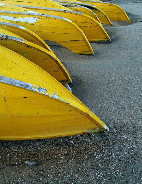 Yellow canoes are pe...