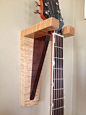 Guitar hanger in curly maple and walnut.: 