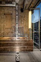YOD Group installs pixel-like mosaics inside Kyiv coffee bar : DOT Coffee Station in Kyiv by YOD Group features an interior with "weird, sincere and universal" mosaic tiles arranged to look like pixels on a screen.