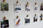 Spray paint bulldog clips and attach them to the wall with sticky tack to create a gallery wall with Polaroids.