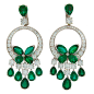Stunning dressy dangle earrings created by Laurence Graff. Feature marquise and pear shape emeralds and round brilliant cut diamonds set in 18k white gold. Total weight of the emeralds is 20.42 carats, total weight of diamonds is 9.16 carats.