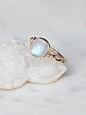 Free People Morro Moonstone x Diamond Ring  : Morro Moonstone x Diamond Ring  | Delicate 14k gold American made statement ring featuring a rose cut rainbow moonstone on a subtly textured band with 2 white diamond accents.  
