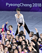 Yuzuru Hanyu of Japan smiles as another performer holds him aloft during the figure skating exhibition gala at the Pyeongchang Winter Olympics in...