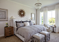 Example of a transitional bedroom design in Jacksonville