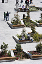 The recuperation of the open space of the place as a garden court on the roof of a new underground parking that had been Plaza de Santo Domingo in Madrid