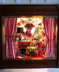 love the curtains on this window display
