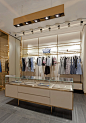 Pinko boutique by Studio Matteo Colla, Beijing – China »  Retail Design Blog : A great central accessories freewall is the shop focal point and also separates the retail space from technical spaces and storage area. 