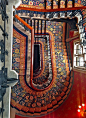 A staircase in the St. Pancras Renaissance London Hotel, from the top looking down.