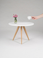 White round coffee table, with solid oak legs, scandinavian design : The design of the desk combines the classic white with the warmth of solid wood. The table top has been finished in a mat protective varnish; the special formula is characterized by extr