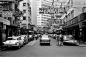 photo629-(ca. 1940s) Hong Kong, cars parked along shops in business district(1)