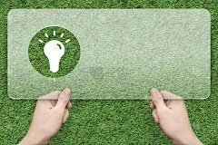 灯泡符号信息框与绿草背景