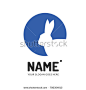 Silhouette of a rabbit in a blue circle. Vector logo design. Business concept icon.