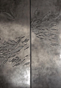 Elevator door. Bas relief