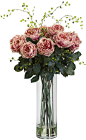 Features:  -Liquid Illusion faux water.  -Gorgeous mix of rose floral and willow accessory.  Holiday Theme: -Yes.  Product Type: -Floral Arrangements.  Flower: -Roses.  Container Finish: -Clear.  Seas