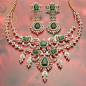 Emerald and diamond necklace: 
