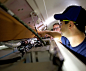 Aircraft technicians working on mechanics