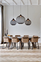 Dramatic pendant lights - great with a full height ceiling.: