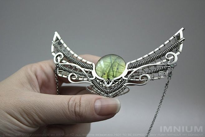 Winged sun necklace ...