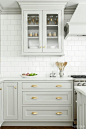 Pale gray cabinetry, brass hardware, subway | Heidi Piron Design: 