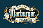 This may contain: the marburger pilsner logo on a dark blue background with white flowers