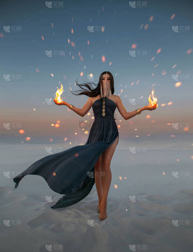 美丽的女巫师手里拿着火。艺术摄影幻想模型...