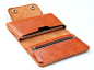 Leather iPhone wallet case in Orange Brown -  with zipper and cards slot. $35.00, via Etsy.