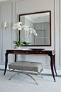 Refined Foyer. Designed by Elizabeth Metcalfe Interiors & Design Inc. www.emdesign.ca - featuring a Thomas Pheasant Table and Barbara Barry Bench & Mirror, all from Baker Furniture