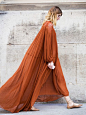 Airy, oversize maxi dresses go well with ankle-tie flats or sandals: 