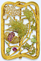 AN ART NOUVEAU GEM-SET ENAMEL BUCKLE BROOCH, BY LUIS MASRIERA. The openwork gold mount with plique à jour enamel, ruby and rose-cut diamond thistles within a textured rectangular gold vine frame, mounted in gold, circa 1904