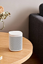 Smart speaker on round table in apartment by Martí Sans for Stocksy United
