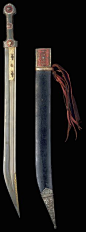 Persian kinjal, 19th century, typical form with watered steel single-edged blade with three engraved gutters with gold overlay floral decoration above the point and on the forte, with inscription on verso in nasta'liq, ox-horn hilt with three pins with fi