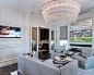 Example of a classic dark wood floor and brown floor home bar design in Tampa