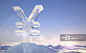 Frozen yen sign on top of mountain peak in snowy landscape at sunrise