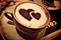 Фото Чашка кофе стоит на блюдце, в которой образовались два сердца Costa