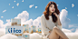 yinxinag1__Asian_women_sit_on_white_steps_with_the_sky_as_the_b_8f3785e2-4fc4-4029-a1d0-827ad4d17653