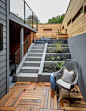 The terraced backyard includes a covered patio and drought-tolerant plantings. Photo: Dennis Mayer #terrace