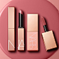 Photo by NARS Cosmetics on May 25, 2023. May be an image of one or more people, makeup, lipstick, cosmetics and text.