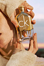 Calvin Klein CK One Gold ~ a woody scent of guiac wood and fig!