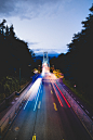 time-lapse photography of road during night