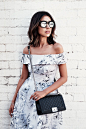 ASOS midi dress in floral organza | ILLESTEVA Boca mirrored sunglasses | CHANEL Boy flap bag in perforated leather | CARVELA Gosh black strap heeled sandals via ASOS | SARINA SURIANO Crystal orbis pearl bangle | TIFFANY & CO Atlas open ring | WANDERLU