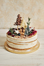 vertical-shot-beautiful-cake-with-christmas-toppings_181624-60334